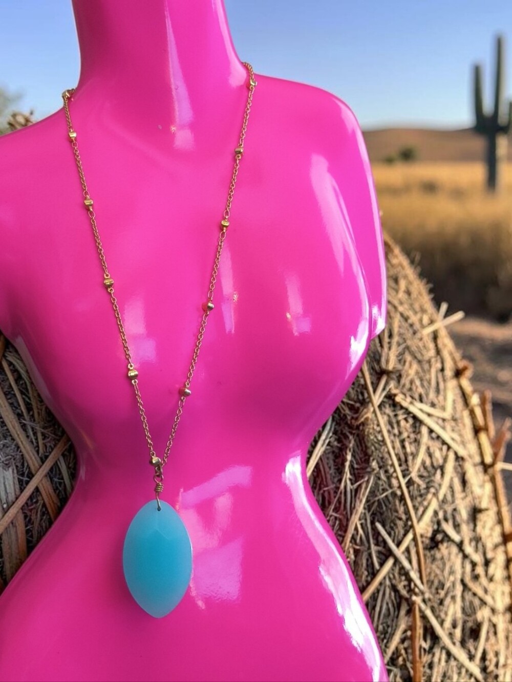 Goldtone Chain Necklace with Blue Teardrop Pendant